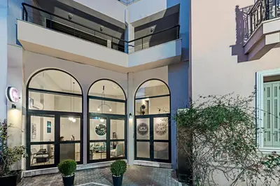 a building with large windows and a balcony at BED in Athens in Athens