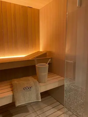 a bucket sitting on a shelf in a sauna at MIRIVILI hospitality & wellness in Athens