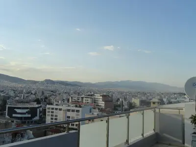 a view of the city from the balcony at 7th Floor Stunning View Penthouse in Piraeus in Piraeus