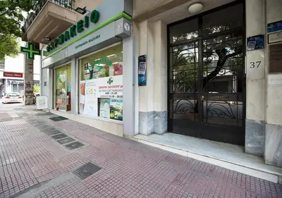 a store on a city street with a storefront at Attractive Flat near the Acropolis Museum & Metro Station by Athenian Homes in Athens