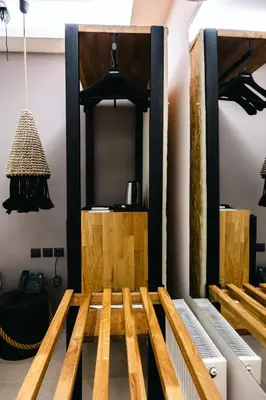 a room with wooden dividers and a table at Mikelina Boutique Hotel in Pallíni