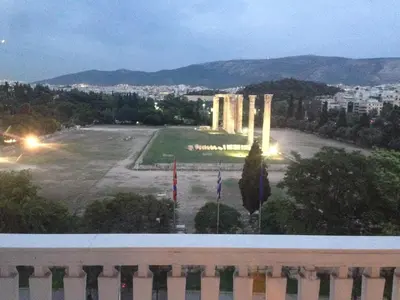 a view from the balcony of a building with a park at Athens Grand Suite in Athens