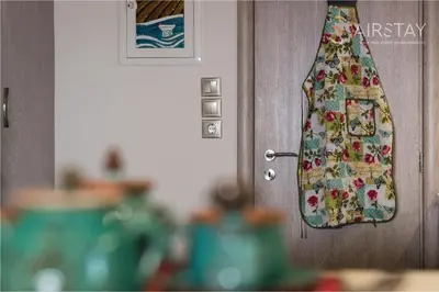 a door with a quilt hanging on it at Orianna Apartment Airport by Airstay in Spáta
