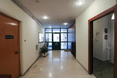 an empty hallway in an office building with a door at Victoria Jewels in Athens