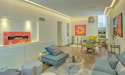 a living room with a couch and a table at Stylish and cozy house in Athens, Plaka in Athens