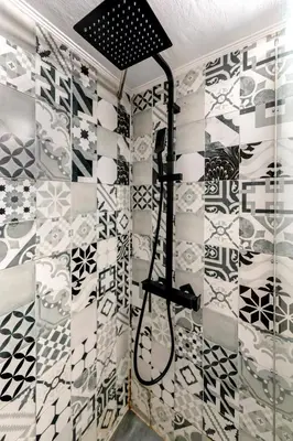 a shower in a room with tiled walls at Athens Near Acropolis in Athens