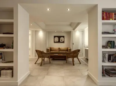 a living room with a couch and two chairs at Right under the Acropolis in Athens