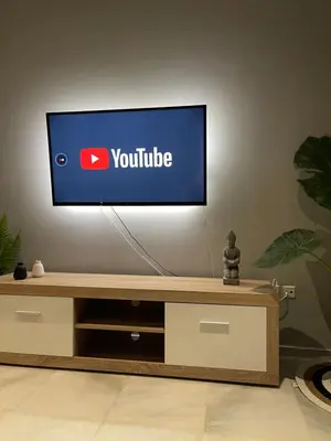 a flat screen tv sitting on top of a table at Aggelikis House in Spáta