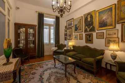 a living room with a couch and a table at Plaka Vintage in Athens