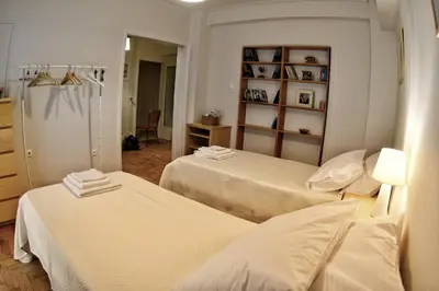 a room with two beds in a room at Top Koukaki Location 3rd floor 2bdr in Athens