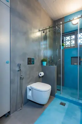 a bathroom with a toilet and a shower at Lagonisi Villa Afroditi in Lagonissi