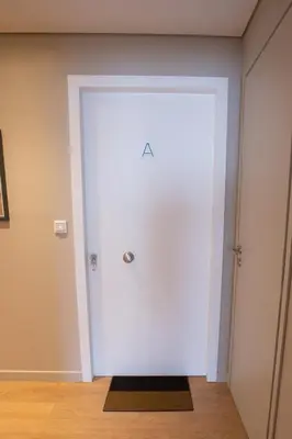 a white door in a room at Athens Center Panoramic Flats in Athens