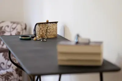 a black table with a bag on top of it at Luxury three bedroom Apartment in Kolonaki in Athens