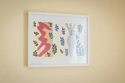 a picture of a framed picture on a wall at Heart of the City in Athens