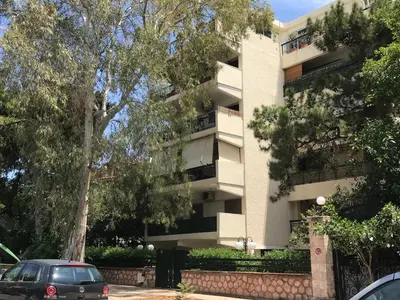 a building with a car parked in front of it at Aris sweet home in Athens