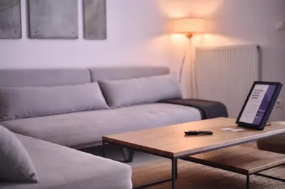a living room with a couch and a coffee table at Soho Apartments by Olala Homes in Athens