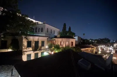 a view of a city at night at Acro&Polis in Athens