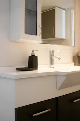 a bathroom counter with a sink and a mirror at Athens Vintage Apartment - Ilisia in Athens