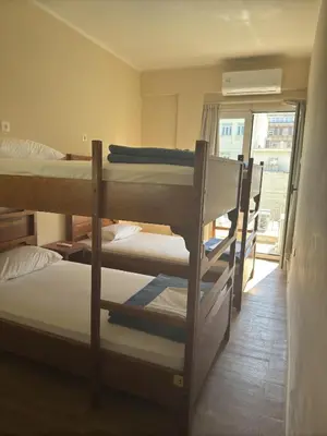 a group of bunk beds in a room at Paloma in Athens