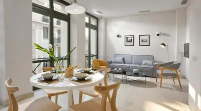 a living room with a table and chairs and a couch at Thission Luxury Homes & SPA by K&K in Athens