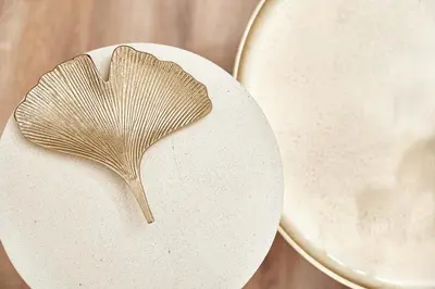 a wooden comb sitting on top of a white plate at Athens Premium Suites - Sunny 2 Bedroom Suite with Parking in Athens