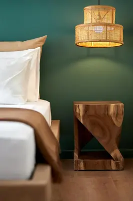 a bedroom with a bed and a table with a lamp at Athens Premium Suites - Sunny 2 Bedroom Suite with Parking in Athens