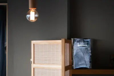 a room with a book shelf and a light at 5* Penthouse Acropoli View Loft in Athens