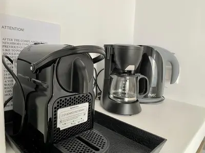 a toaster and a coffee maker on a counter at Athenaeum Acropolis Residence 1min to Museum in Athens