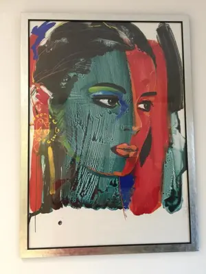 a painting of a woman on a wall at Elegant Acropolis in Athens