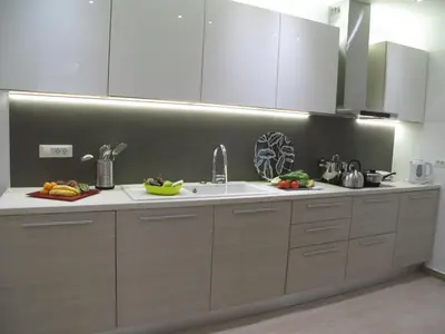 a kitchen with white cabinets and a sink at Elegant Acropolis in Athens