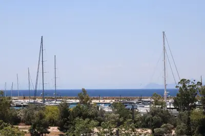 a group of boats parked in a marina at IKAROS Hotel ELLINIKO in Athens