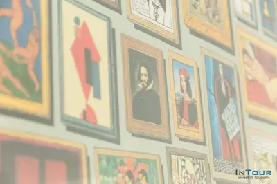 a wall with a bunch of pictures on a wall at Art point under Acropolis in Athens