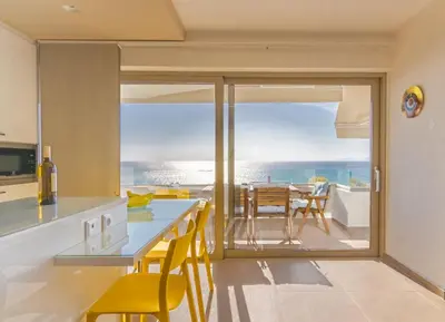 a kitchen with a view of the ocean at Best Seaview Attica in Saronida