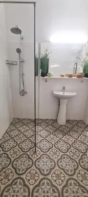 a bathroom with a shower and a sink at Vintage Charm by the Acropolis! in Athens