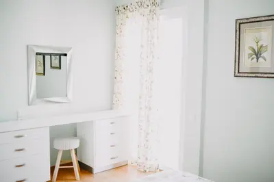 a bedroom with a white vanity and a mirror at Best House, Rooftop Aprtm., Marina Zeas Piraeus in Piraeus