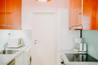 a kitchen with a sink and a microwave at Best House, Rooftop Aprtm., Marina Zeas Piraeus in Piraeus