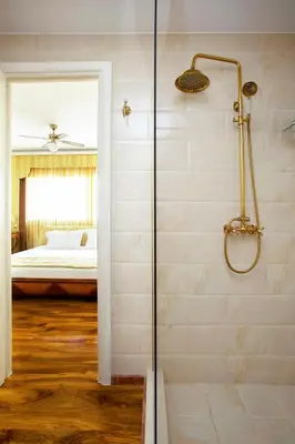 a bathroom with a shower and a bedroom at Unique 3-Bed, 3-Bath Apt with Acropolis Views SG69 in Athens