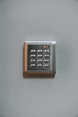 a remote control sitting on top of a wall at The Historical Center Studios in Athens
