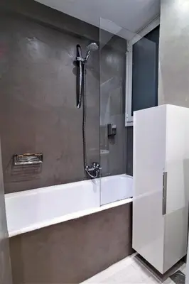 a bathroom with a shower with a tub at Best neighbourhood apartment in Athens near metro station & hospitals in Athens