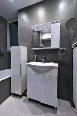 a white kitchen with a sink and a refrigerator at Best neighbourhood apartment in Athens near metro station & hospitals in Athens