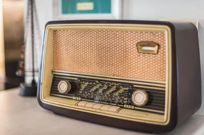 an old radio sitting on top of a table at Photostory Art Studio in Athens