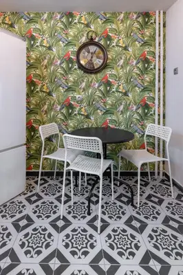 a dining room with a table and four chairs at Athens Parrot in Athens