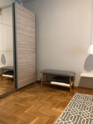 a room with a bench and a sliding door at Acropolis View Penthouse N in Athens