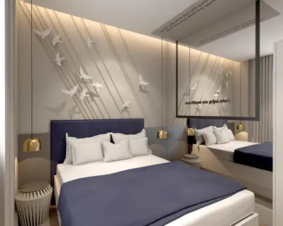 a bedroom with two beds and birds on the wall at Great Living Koukaki in Athens
