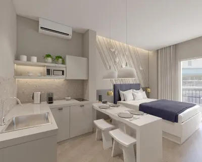 a bedroom with a bed and a kitchen with a sink at Great Living Koukaki in Athens