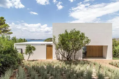 a house in the middle of a field at The Margi Villa in Athens