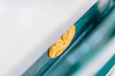 a close up of a plate with an orange slice at Phaedra Hotel in Athens