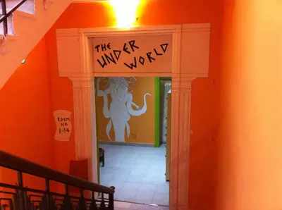 a hallway with a sign that says the unhappy way at Zeus Hostel in Athens