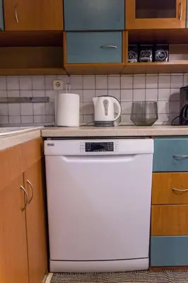 a kitchen with a stove and a dishwasher at Stylish apt in Athens center in Athens