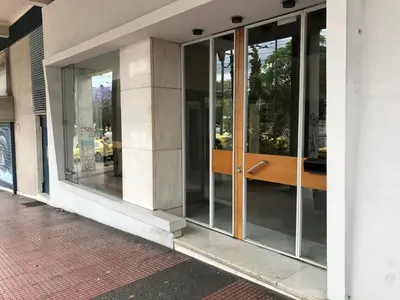 a facade of a building with glass doors at TONI'S Brand-New Studio next to Syntagma Square in Athens